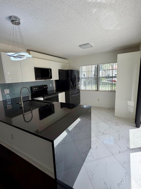 Tiny photo for 8161 Andover Court #61d, Lake Clarke Shores, FL 33406 (MLS # B26048607)