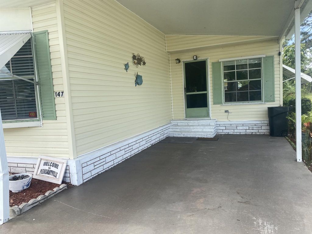 Photo of 147 E Caribbean, Port Saint Lucie, FL 34952 (MLS # R10972071)