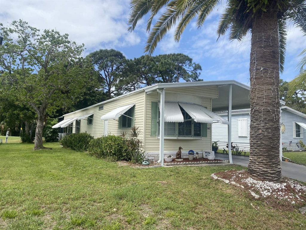 Photo of 147 E Caribbean, Port Saint Lucie, FL 34952 (MLS # R10972071)