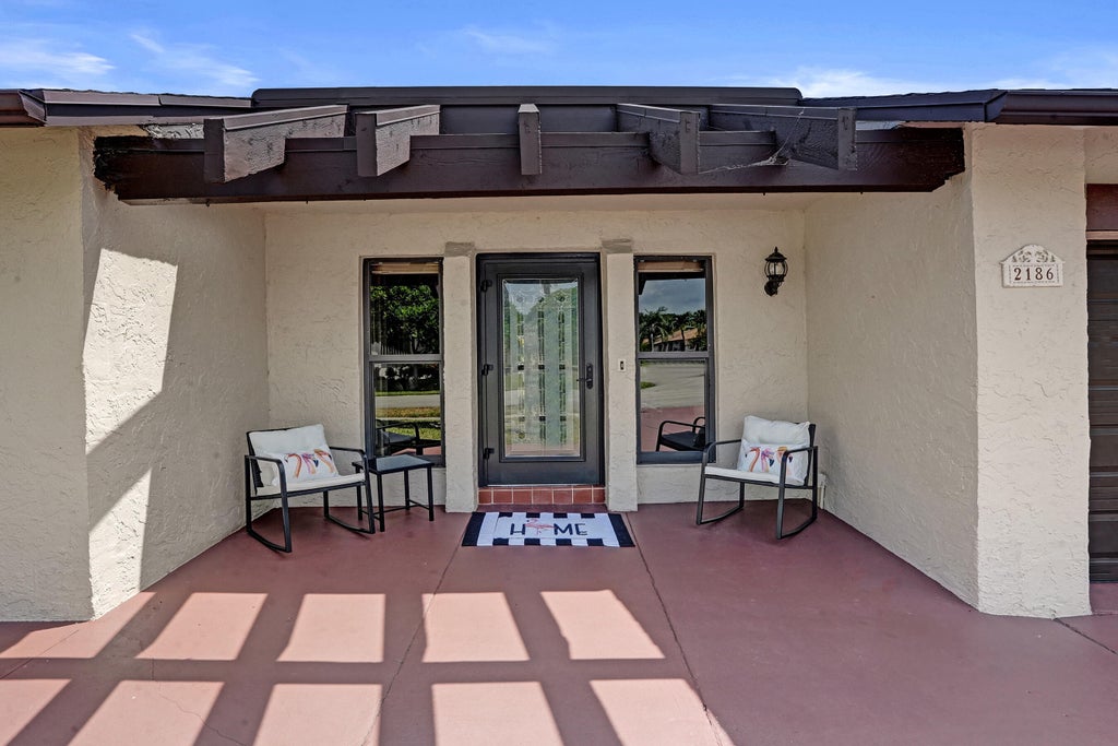 Photo of 2186 SW 16th Circle, Deerfield Beach, FL 33442 (MLS # B26068954)