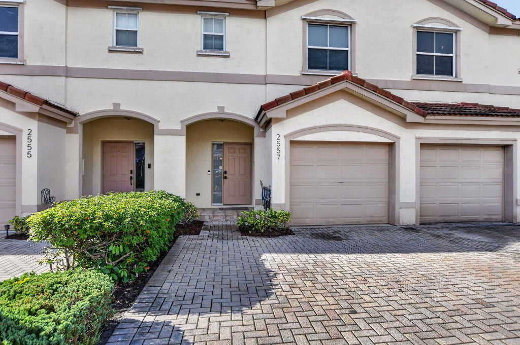 Photo of 2557 Riverside Drive, Coral Springs, FL 33065 (MLS # B26077834)