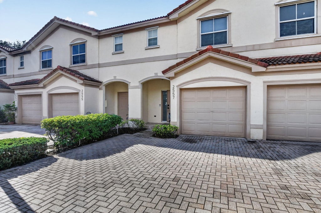 Photo of 2557 Riverside Drive, Coral Springs, FL 33065 (MLS # B26077834)