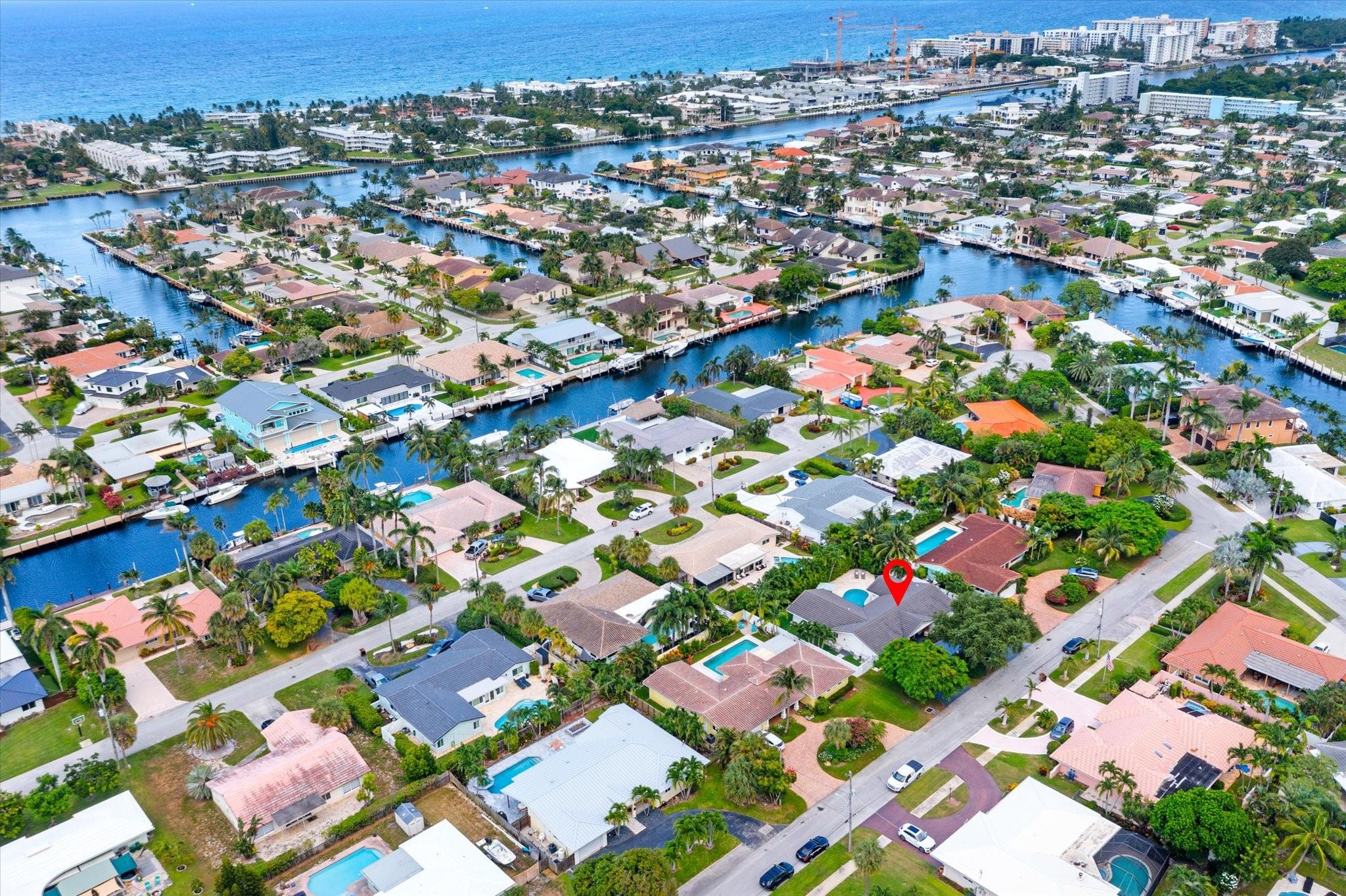 Live the Florida Coastal Dream! Just 1.5 miles to the beach, this stunning 3/3 pool home in Deerfield Beach offers stylish living with every modern upgrade. Enjoy a quartz kitchen, impact glass pocket doors, en-suite baths, new A/C (2023), and gym-ready garage. The tropical & fully fenced backyard features lush palms, a travertine patio, and a bean-shaped pool. Walk or bike to award-winning beaches, top dining, and shopping (Sprouts, Whole Foods, Trader Joe’s). Minutes to Boca, Delray, and Fort Lauderdale with easy access to I-95, Brightline, and 3 airports. A true indoor/outdoor oasis—turnkey and maintenance-free!