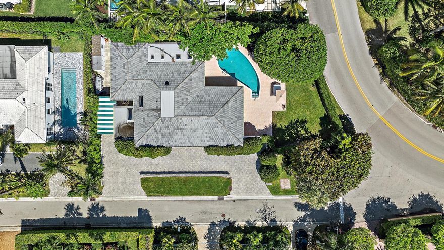 PARADISE ON THE NORTH END!Fabulous opportunity to renovate or build new on this oversized 11,700+ sq. ft lot just steps from the best beach on the island. Spacious open living and dining rooms overlook the sparkling pool and yard. All three bedrooms have ensuite baths with the Primary overlooking the lovely grounds and pool. A three year old tile roof and gleaming hardwood floors throughout. The new owner will have the ability to enjoy the home while figuring out plans or rent immediately as this home is move in ready.