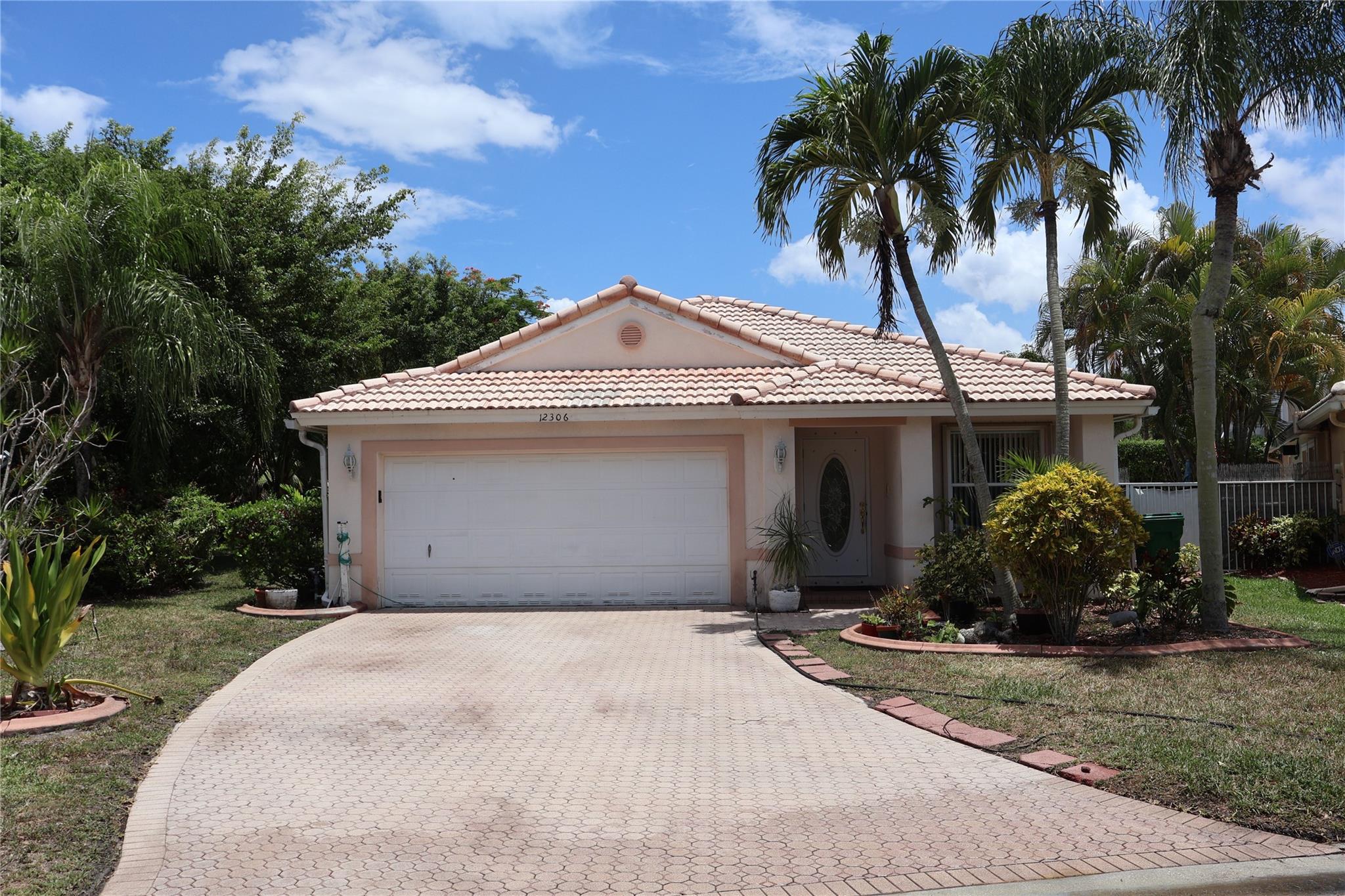 Great Opportunity in Coventry at Wyndham Lakes!
Located in a family-friendly, gated community, this home sits on a large pie-shaped lot with a spacious yard—perfect for kids and pets to play. Enjoy outdoor living with a dome-screened pool and patio area, ideal for entertaining or relaxing. Accordion hurricane shutters. New AC
Inside, you’ll find vaulted ceilings and tile floors in the main living areas, along with a comfortable family room layout. Zoned for top-rated schools, including Marjory Stoneman Douglas High and Eagle Ridge Elementary, this home is a smart choice for growing families.
While it could use a little TLC, this home has great bones and is priced to sell quickly. A fantastic opportunity to customize and add value in one of Coral Springs’ most desirable neighborhoods!