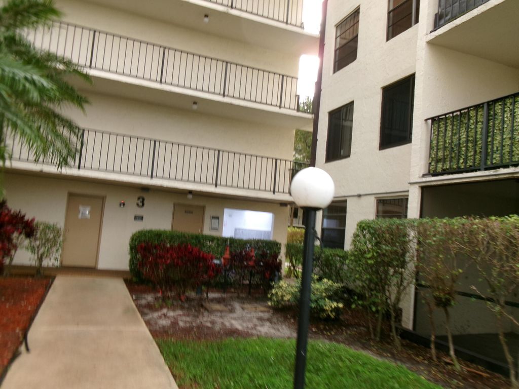 Photo of 6190 Woodlands Blvd #309, Tamarac, FL 33319 (MLS # B26000695)