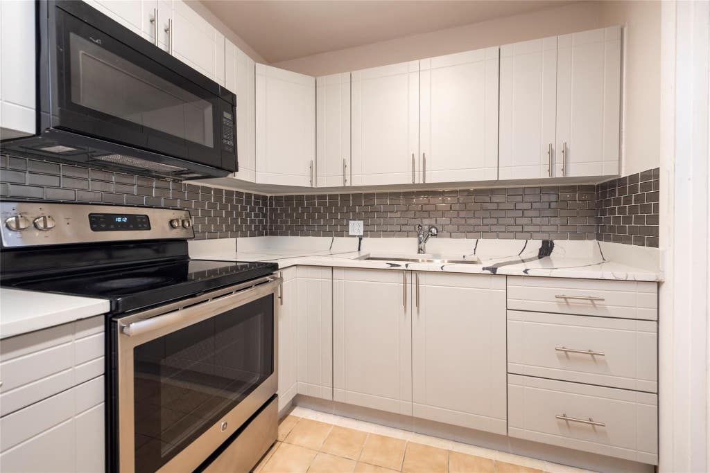 Photo of 1310 NW 43rd Avenue #309, Lauderhill, FL 33313 (MLS # B26049488)
