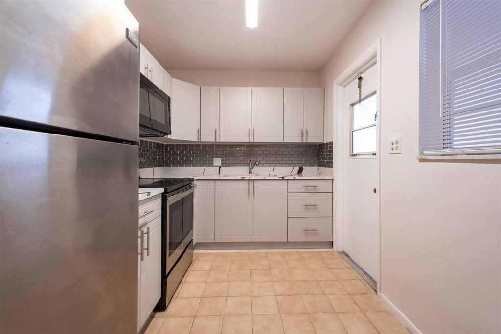 Photo of 1310 NW 43rd Avenue #309, Lauderhill, FL 33313 (MLS # B26049488)