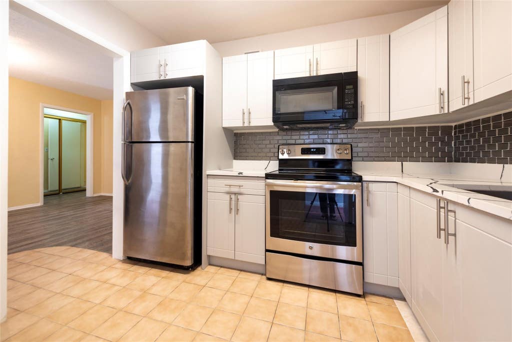 Photo of 1310 NW 43rd Avenue #309, Lauderhill, FL 33313 (MLS # B26049488)