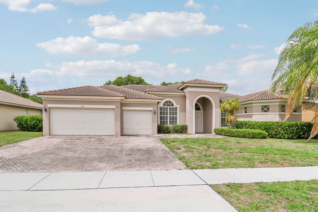 Photo of 1599 Newhaven Point Lane, West Palm Beach, FL 33411 (MLS # B26012459)