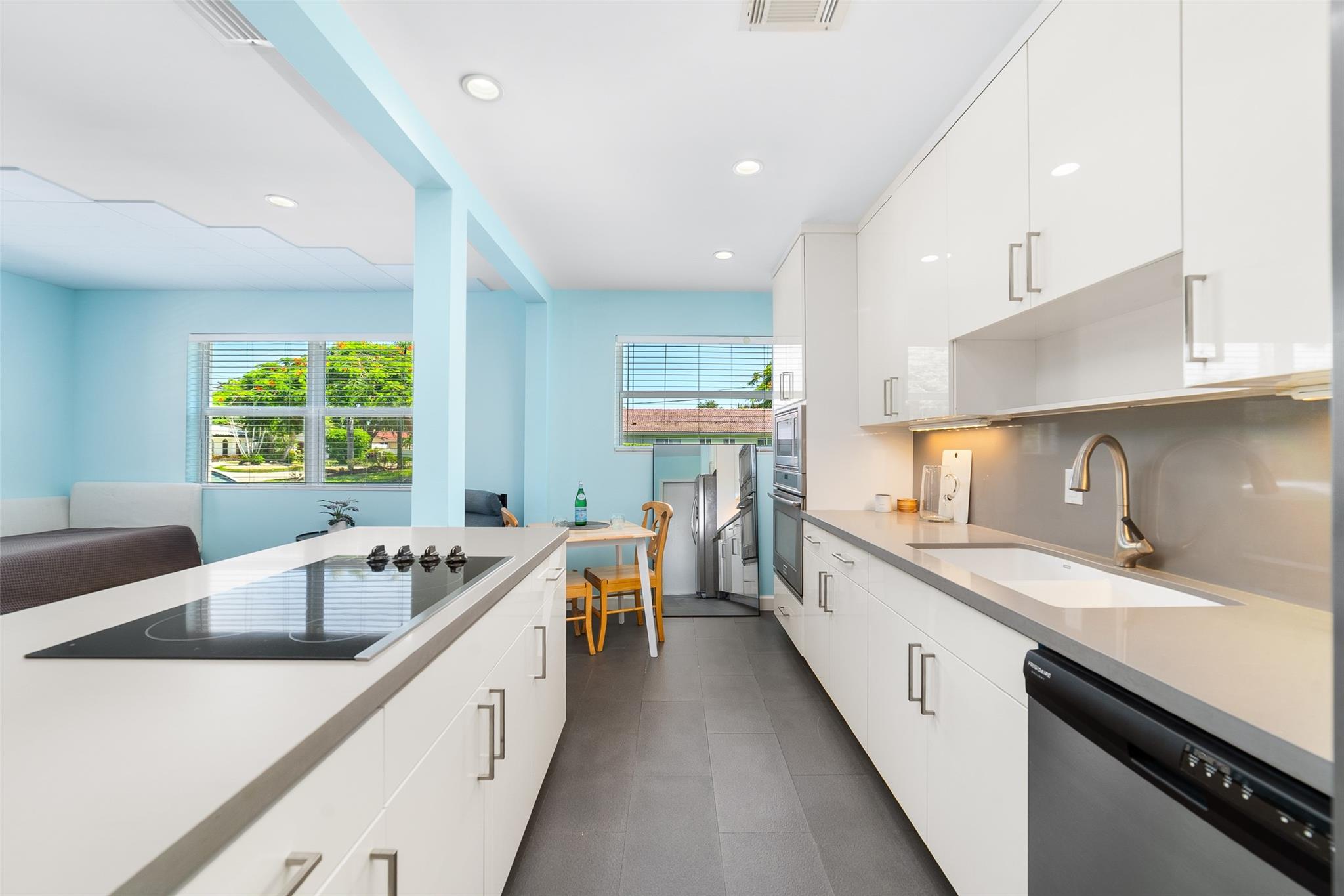 Completely renovated and beautifully finished, this first-floor 1 bed, 1 bath condo offers a bright and inviting living space with 718 sq ft. Enjoy views of the pool just outside your window, along with impact windows, a spacious walk-in closet, professionally soundproofed ceiling with Green Glue and added 5/8” drywall layer, and an open layout that maximizes comfort. The boutique waterfront community is tucked along a navigable canal with ocean access, offering a peaceful setting and the convenience of a boat dock. Residents can also enjoy a canal-front pool and on-site shared laundry. With easy access to nearby shops, dining, this location blends relaxation and convenience. A fantastic opportunity to enjoy the coastal lifestyle, this lovely property is RENTABLE IMMEDIATELY.
