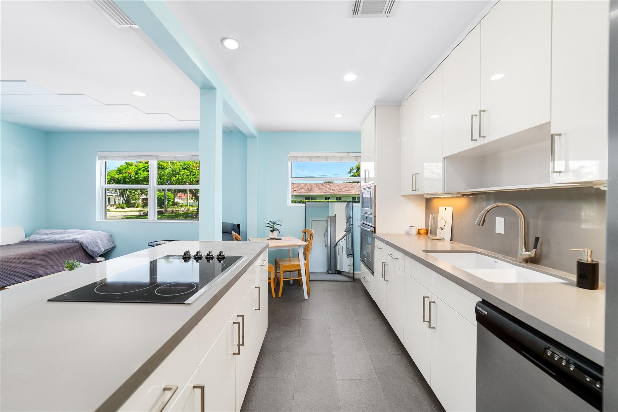 Completely renovated and beautifully finished, this first-floor 1 bed, 1 bath condo offers a bright and inviting living space with 718 sq ft. Enjoy views of the pool just outside your window, along with impact windows, a spacious walk-in closet, professionally soundproofed ceiling with Green Glue and added 5/8” drywall layer, and an open layout that maximizes comfort. The boutique waterfront community is tucked along a navigable canal with ocean access, offering a peaceful setting and the convenience of a boat dock. Residents can also enjoy a canal-front pool and on-site shared laundry. With easy access to nearby shops, dining, and main roads, this location blends relaxation and convenience. A fantastic opportunity to enjoy the coastal lifestyle in a well-cared-for, move-in ready home.