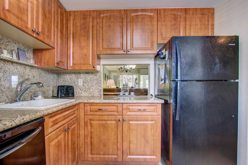 Photo of 7797 Golf Circle Drive #103, Margate, FL 33063 (MLS # B26002440)