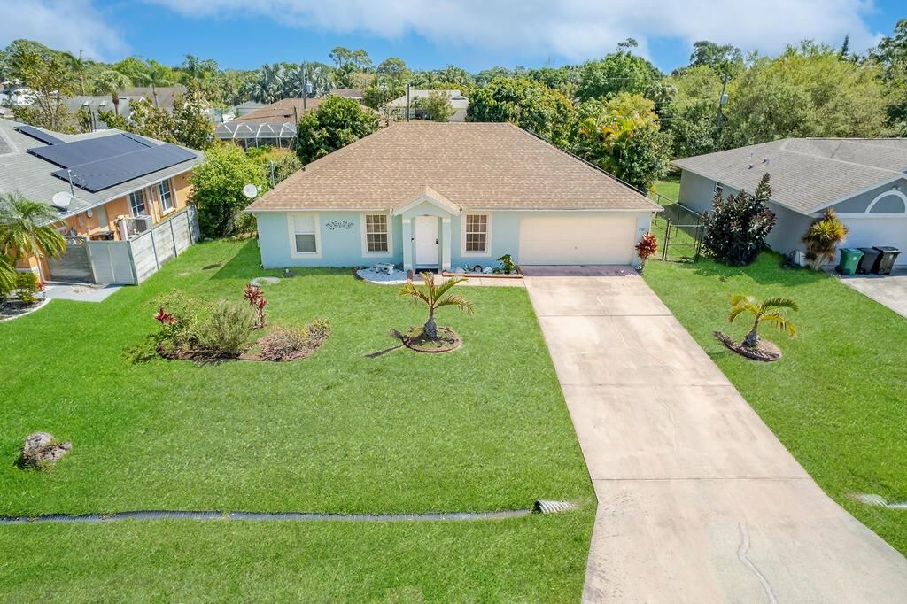 Photo of 2381 SW Lejune Street, Port St Lucie, FL 34953 (MLS # R10873636)