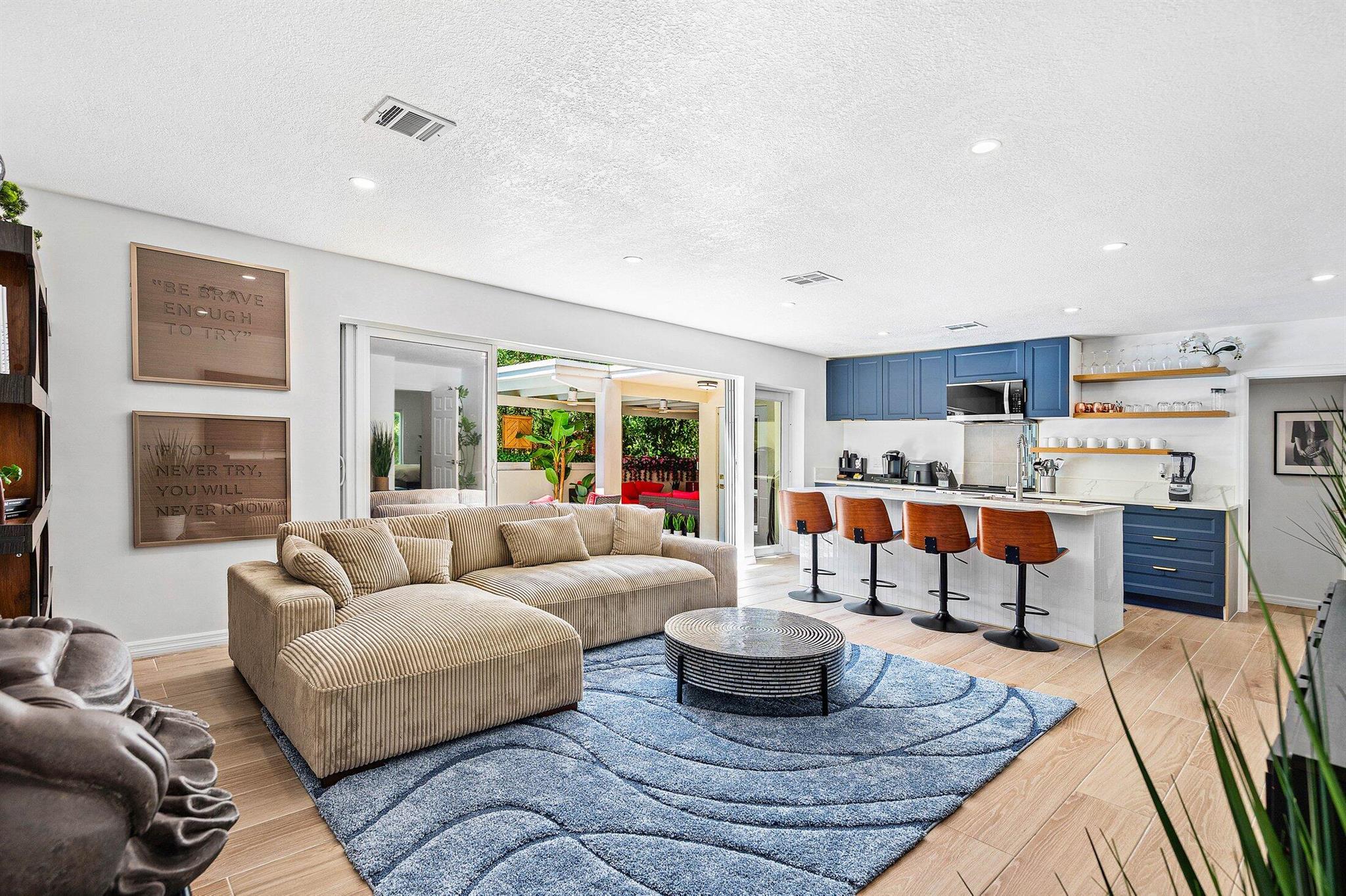 his completely reimagined single-story residence embodies modern style and thoughtful design at every turn. Offering exceptional privacy and a seamless connection between indoor and outdoor living, the home is crafted for both comfort and sophistication. Highlights include a serene outdoor primary soaking tub, a resort-style pool, and a chic lounge area--perfect for relaxation or entertaining. Blending warmth, functionality, and elevated design, this home delivers an unparalleled living experience. All just minutes from downtown Fort Lauderdale and the beaches.