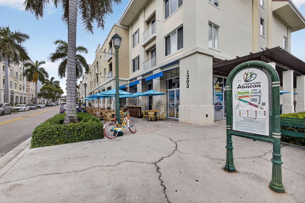 Photo of 1203 Town Center Dr #308, Jupiter, FL 33458 (MLS # B26030628)