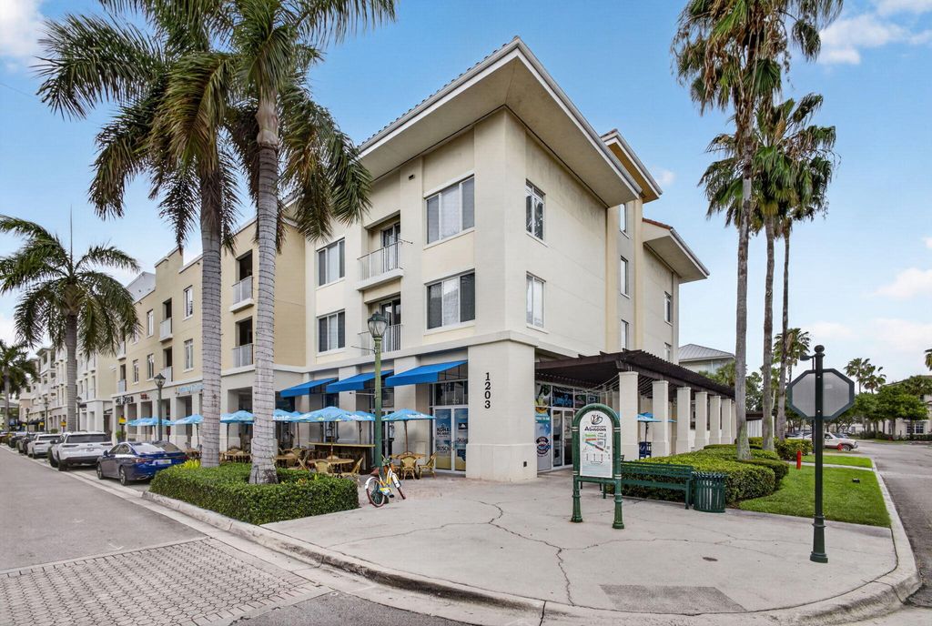 Photo of 1203 Town Center Dr #308, Jupiter, FL 33458 (MLS # B26030628)