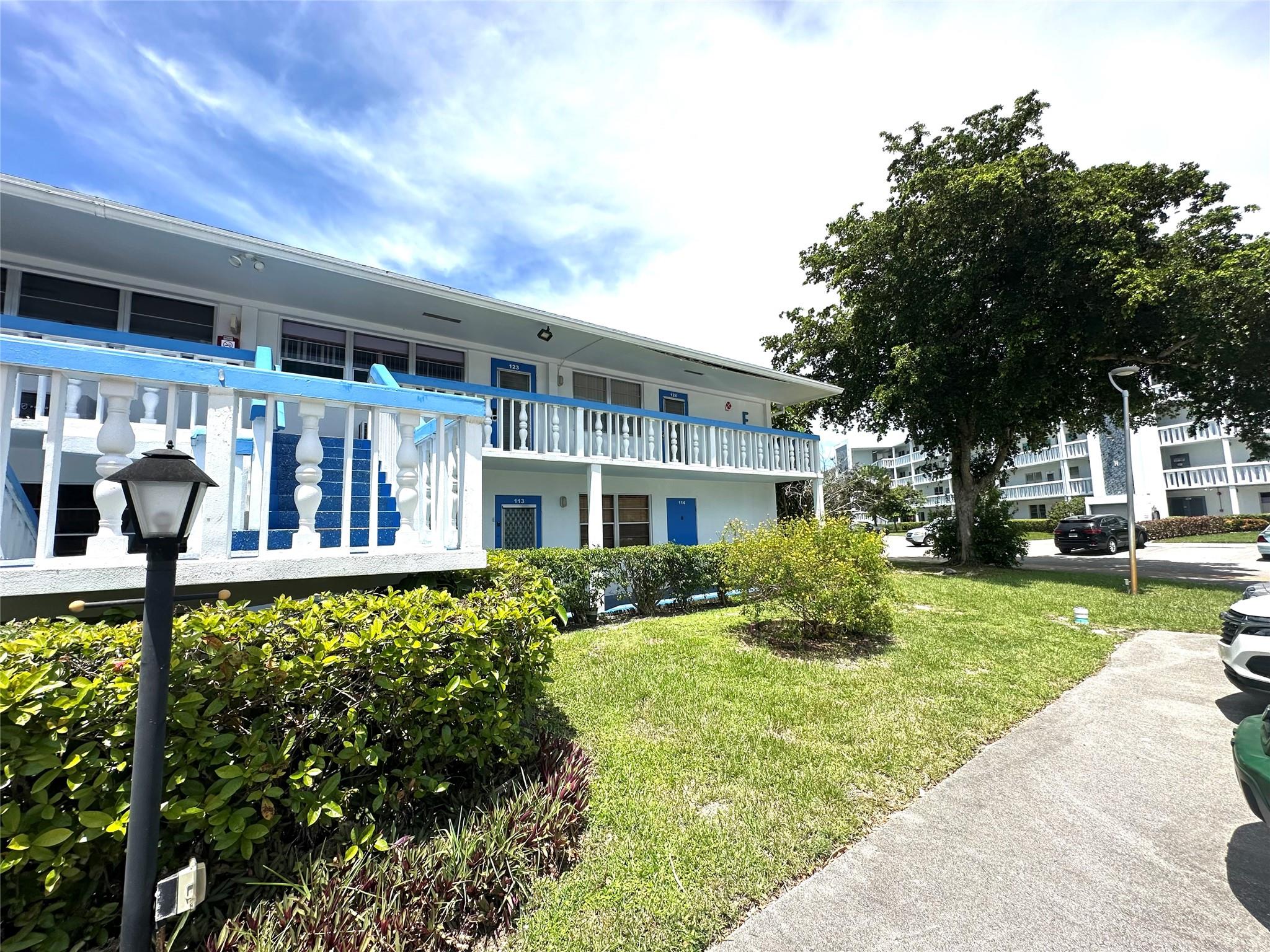 This clean & bright CORNER 2 bedrm, 1.5 bath furnished condo is PRICED RIGHT & ready for you to MAKE IT YOUR OWN! Located on the 2nd flr of a 2 story bldg, this unit features tile flrs in dining room/kit, carpet in liv rm & bedrms, primary bath w/tub/shower combo & glass shower doors & ceiling fans in every room. The encl patio has roll up shutters, ext storage closet & overlooks a nice garden view! Walking distance to pool & tennis! Bldg has a BRAND NEW ROOF! Come enjoy RESORT STYLE living in this gated community w/24 hr sec, free busses, pools, tennis, pickleball, putting green, cafe, BBQ area, an amazing CLUBHOUSE w/movies, shows, indr/outdr pools, gym, sauna, theater, classes, clubs, billiards Located min to beach, dining, shopping & hwys! YOU WILL LOVE LIVING HERE! Assoc. Claims 55+