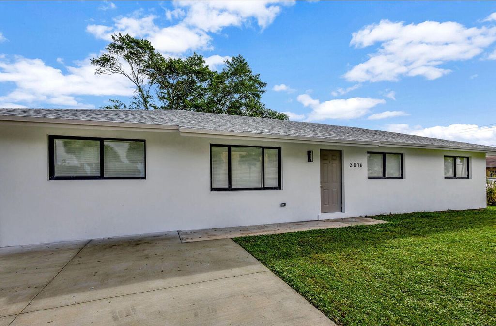 Photo of 2016 Avenue S, Riviera Beach, FL 33404 (MLS # R11162152)