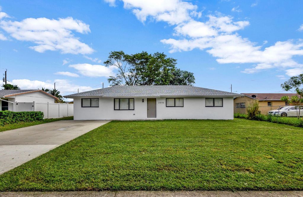 Photo of 2016 Avenue S, Riviera Beach, FL 33404 (MLS # R11162152)