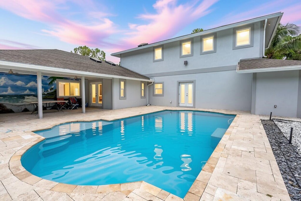 Photo of 13884 89th Place N, West Palm Beach, FL 33412 (MLS # B26063622)