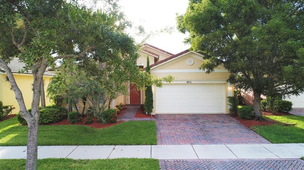 Photo of 9711 SW Glenbrook Drive, Port Saint Lucie, FL 34987 (MLS # R10748003)