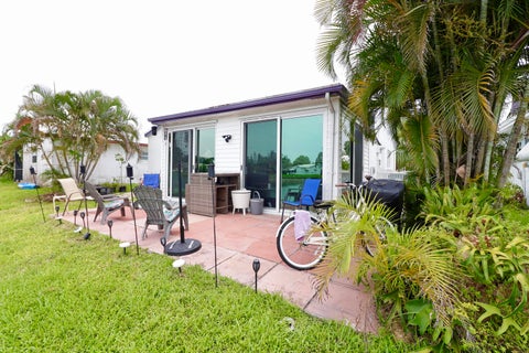Photo of 8103 NW 58TH Place, Tamarac, FL 33321 (MLS # B26054476)