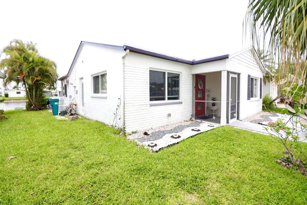 Photo of 8103 NW 58TH Place, Tamarac, FL 33321 (MLS # B26054476)