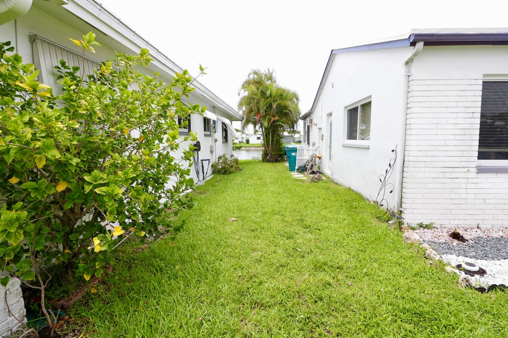 Photo of 8103 NW 58TH Place, Tamarac, FL 33321 (MLS # B26054476)