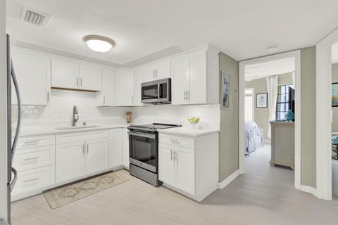 Photo of 2069 NE Collins Circle #7-50, Jensen Beach, FL 34957 (MLS # R11135000)