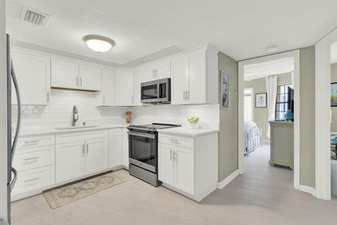 Photo of 2069 NE Collins Circle #7-50, Jensen Beach, FL 34957 (MLS # R11135000)