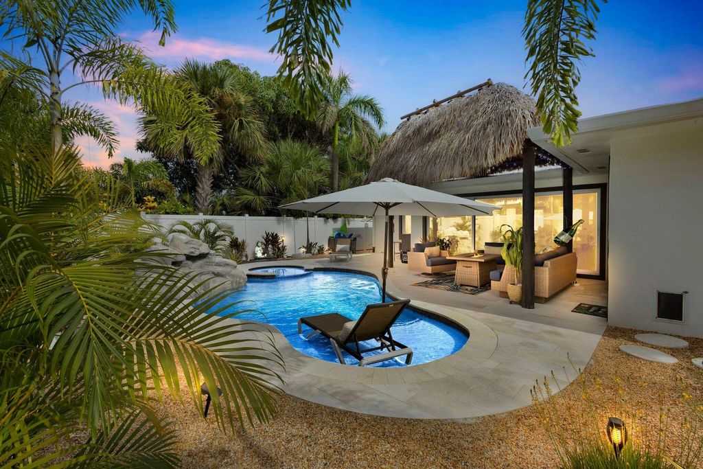 Photo of 226 Bamboo Road, Palm Beach Shores, FL 33404 (MLS # R11052767)