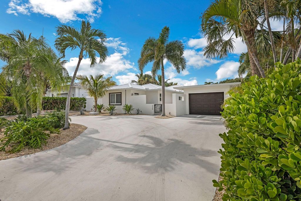 Photo of 226 Bamboo Road, Palm Beach Shores, FL 33404 (MLS # R11052767)