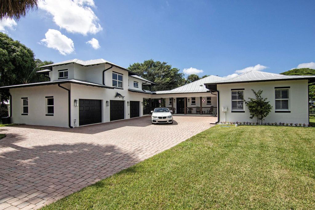 Photo of 310 SE Cardinal Way, Stuart, FL 34996 (MLS # R11132891)