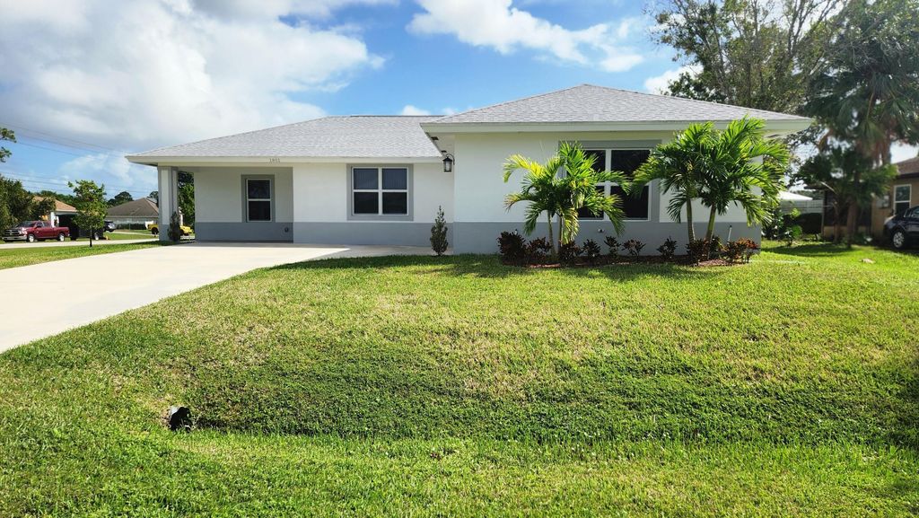Photo of 1801 SW Davis Street, Port Saint Lucie, FL 34953 (MLS # R11006238)