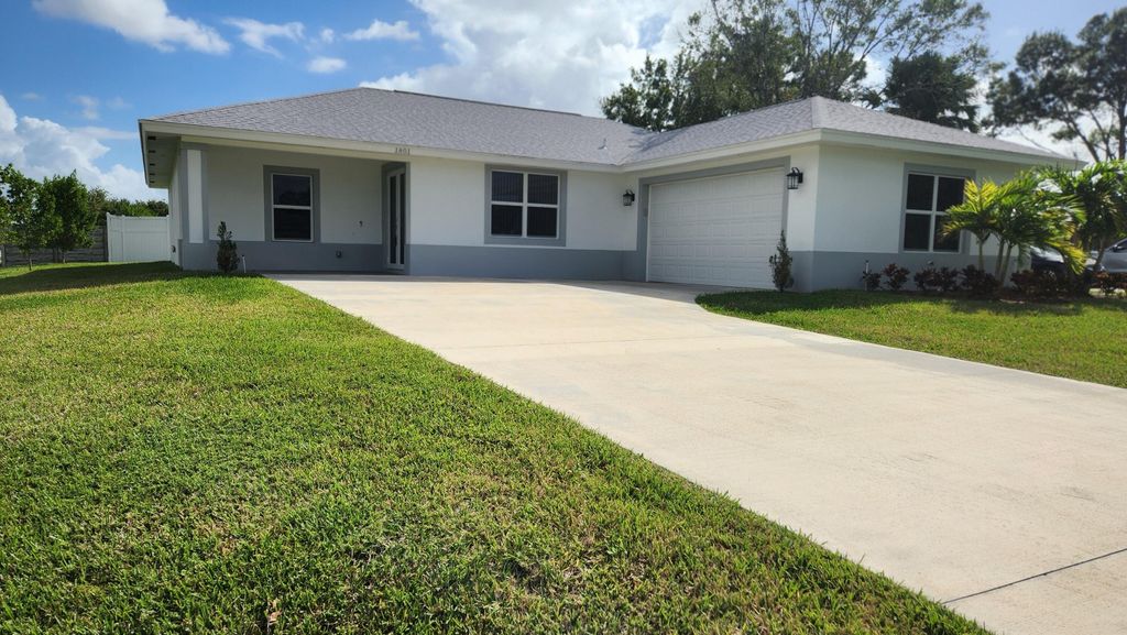 Photo of 1801 SW Davis Street, Port Saint Lucie, FL 34953 (MLS # R11006238)