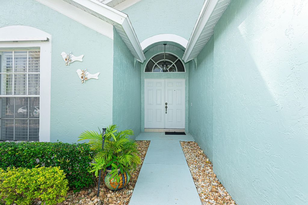 Photo of 316 Hammocks Trail, Greenacres, FL 33413 (MLS # R11161569)