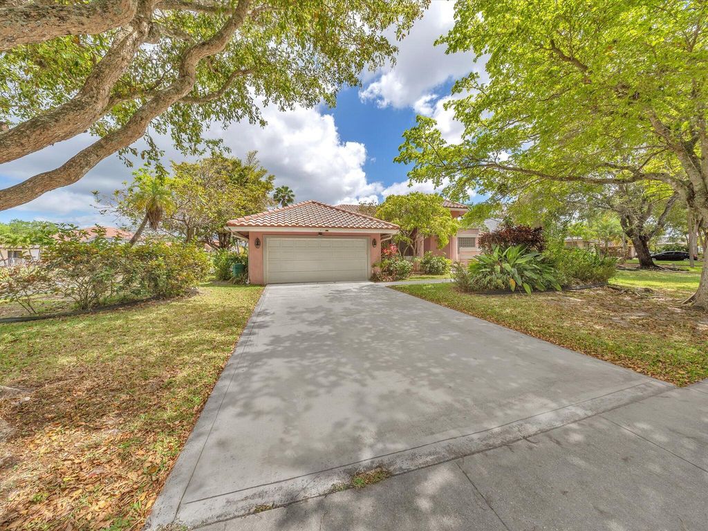 Photo of 5111 NW 104th Avenue, Coral Springs, FL 33076 (MLS # B26005546)