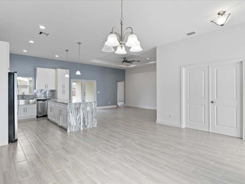 Photo of 1402 SW Santiago Avenue, Port Saint Lucie, FL 34953 (MLS # R10978181)