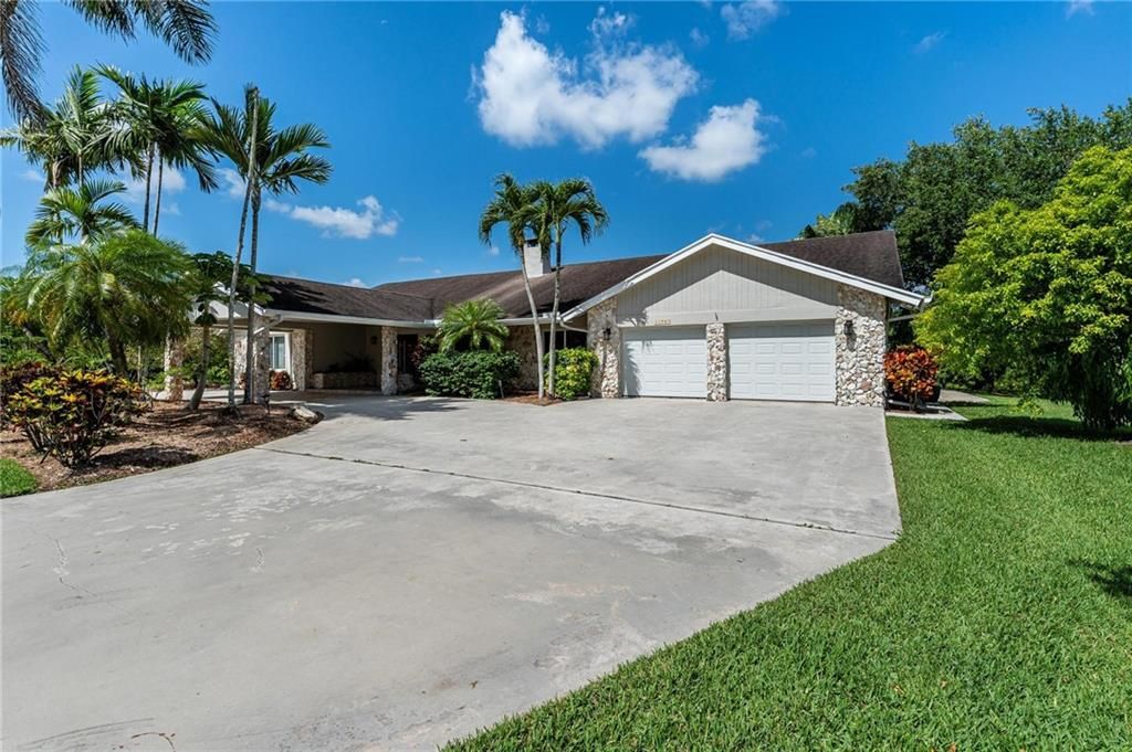 Photo of 11945 SW 42nd CT, Davie, FL 33330 (MLS # F10328167)