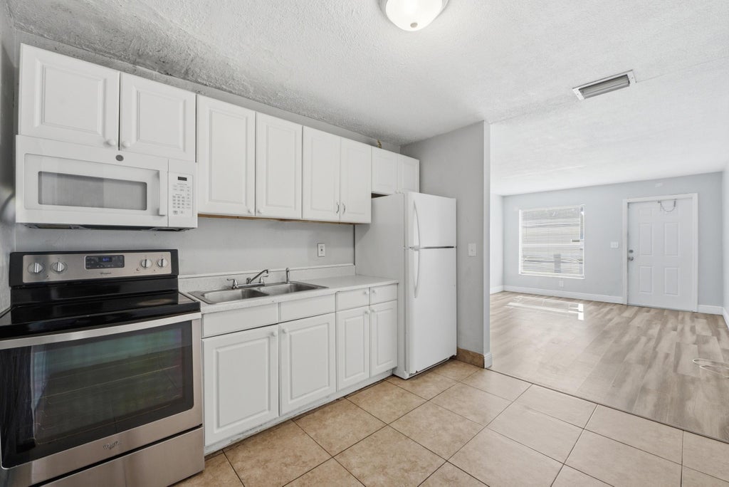 Photo of 2001 A E Isaacs Avenue #2007, West Palm Beach, FL 33407 (MLS # B26042625)