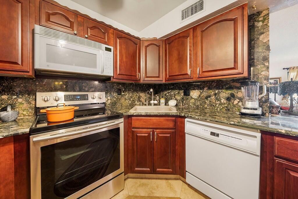 Photo of 9900 Pineapple Tree Drive #106, Boynton Beach, FL 33436 (MLS # R11077699)
