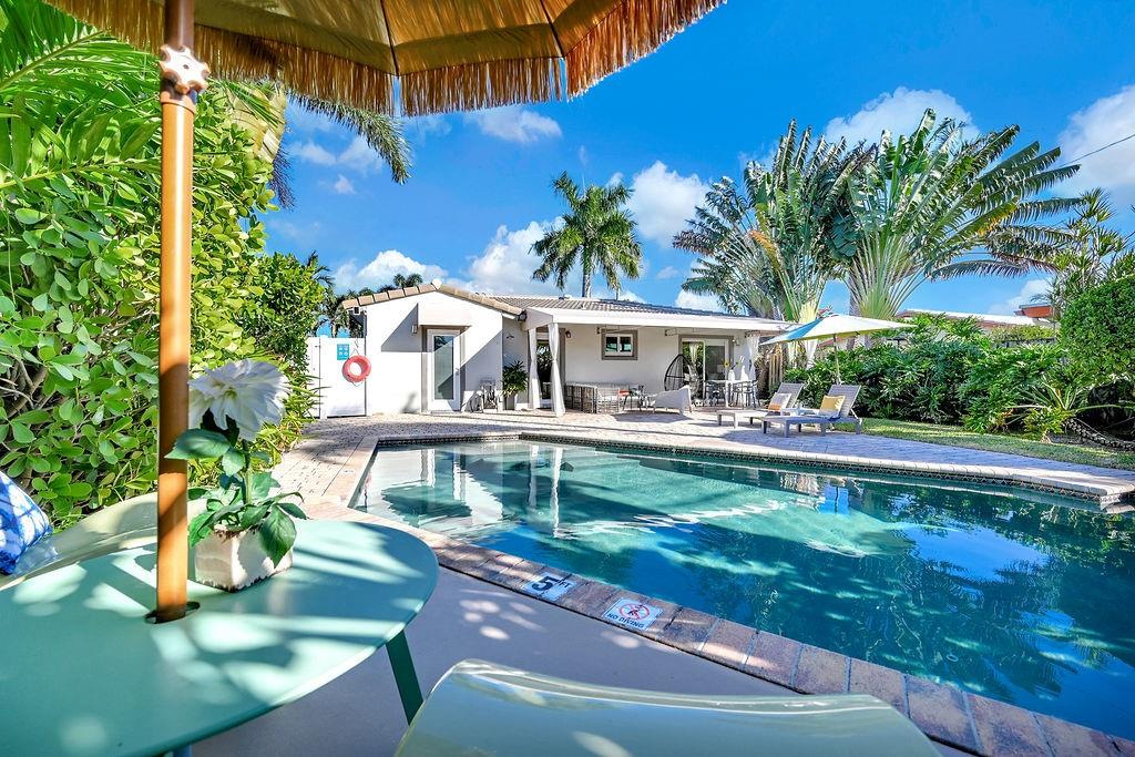 Beautifully maintained home located in one of the safest neighborhoods, features a private pool with newer pool heater and light, impact windows and doors, new roof and plumbing, and elegant wood floors.
The spa style bathrooms boast marble showers, TOTO toilets, GROHE faucets, and a tankless water heater. The kitchen is updated with a new fridge, dishwasher, disposal, and faucet. This property is currently a profitable short-term rental, offering move in ready or income potential.
Buyer and/or agent to verify all information.