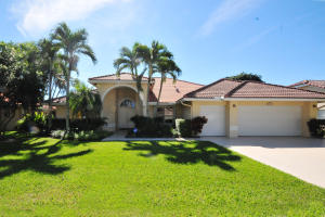 Rare Pebble Beach home, on golf and water lot. This is the largest model in Boca Greens. Split plan, new kitchen, with custom cabinets, beautiful granite counter tops, expanded garage with cart area. Views that just don't quit. Boca Greens is a gated community of almost 600 homes located one mile north of Glades road on US 441. This community is also the home of the Boca Greens County Club. All residents can play the course on a pay for play basis. No membership is required. But for those who do want a country club experience there are a number of non-equity memberships available. Premium cable package and high speed Internet included the homeowner fee.