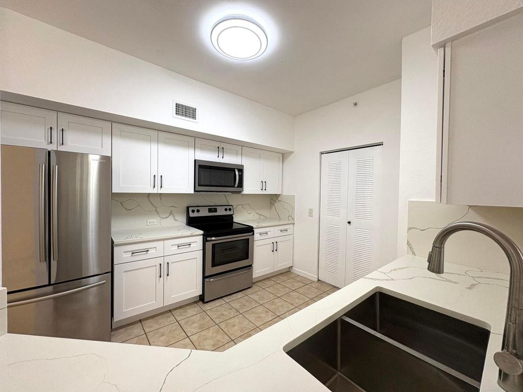 Photo of 340 Crestwood Circle #302, Royal Palm Beach, FL 33411 (MLS # B26033223)