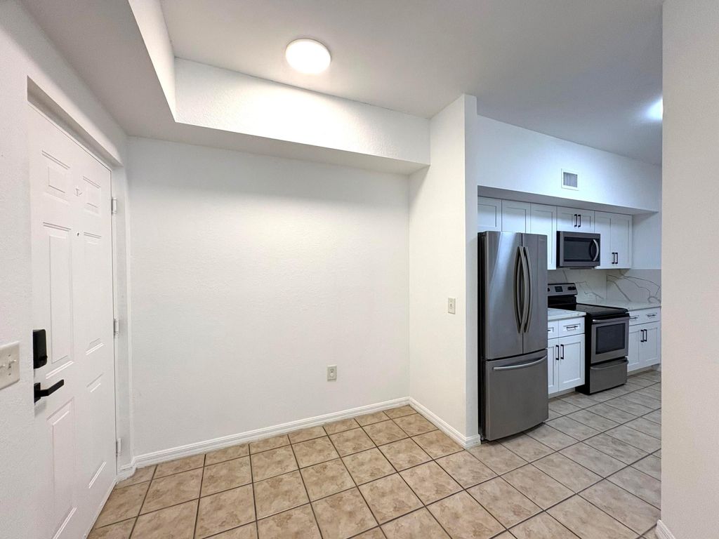 Photo of 340 Crestwood Circle #302, Royal Palm Beach, FL 33411 (MLS # B26033223)
