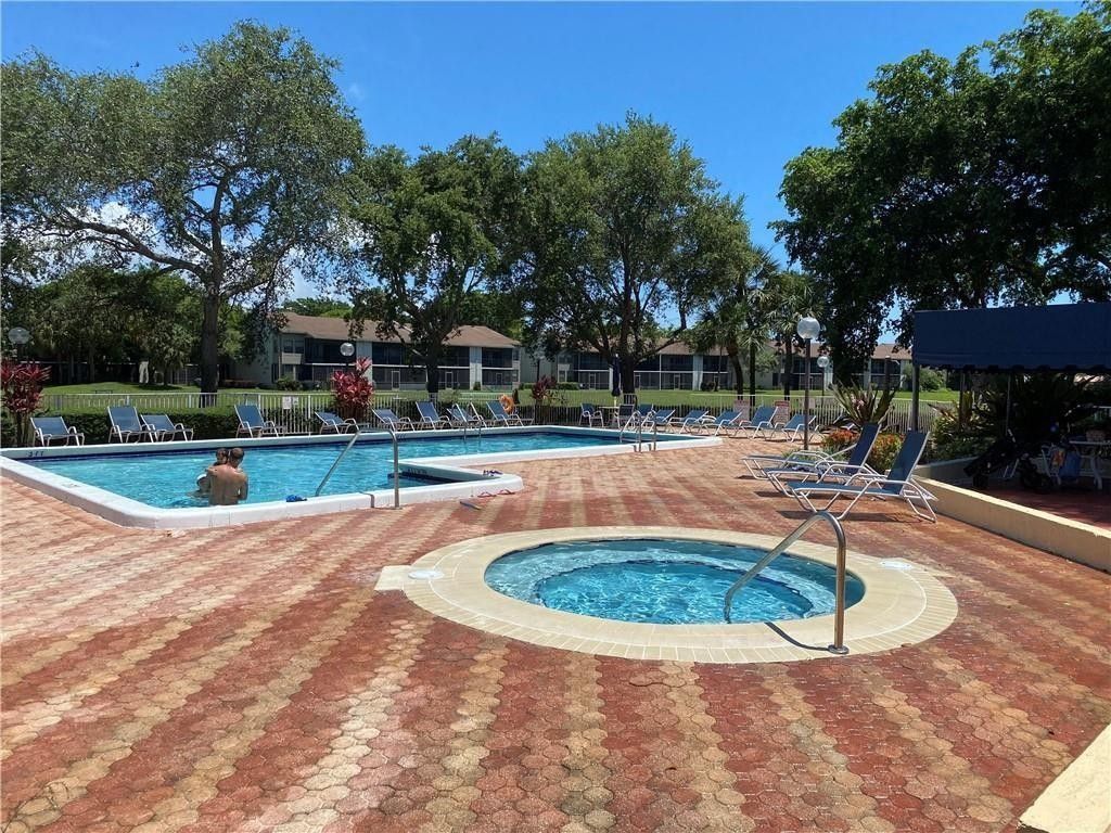 Photo of 1985 SW 15th Street #123, Deerfield Beach, FL 33442 (MLS # F10496399)