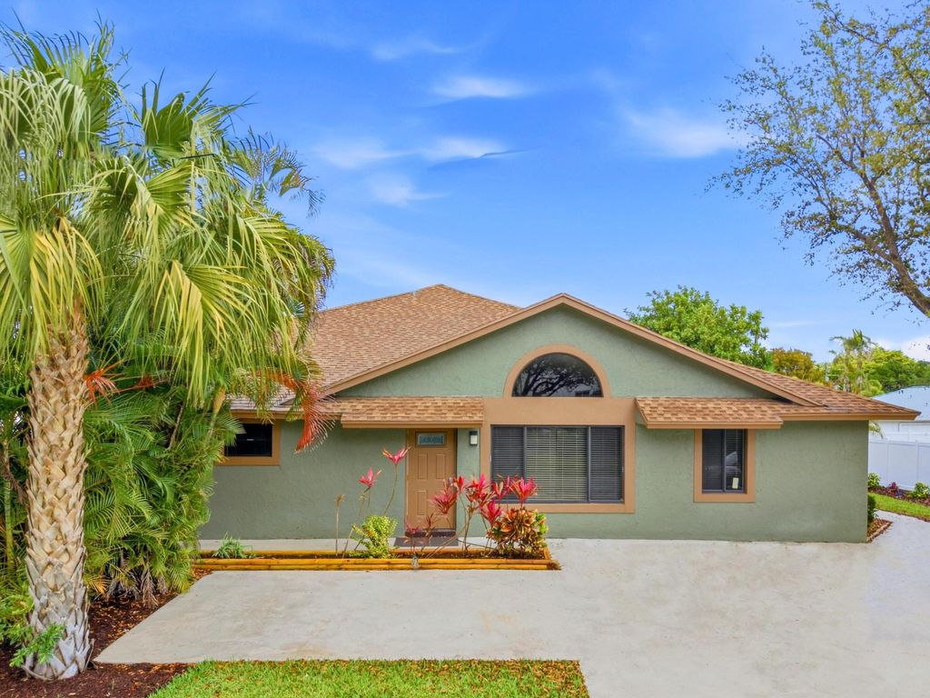 Photo of 825 Dogwood Drive, Delray Beach, FL 33483 (MLS # B26001530)