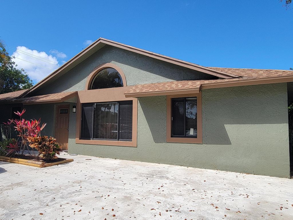 Photo of 825 Dogwood Drive, Delray Beach, FL 33483 (MLS # B26001530)