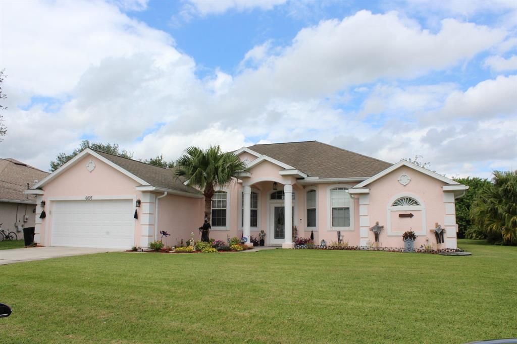 Photo of 6003 NW Wolverine Road, Port Saint Lucie, FL 34986 (MLS # R10752706)